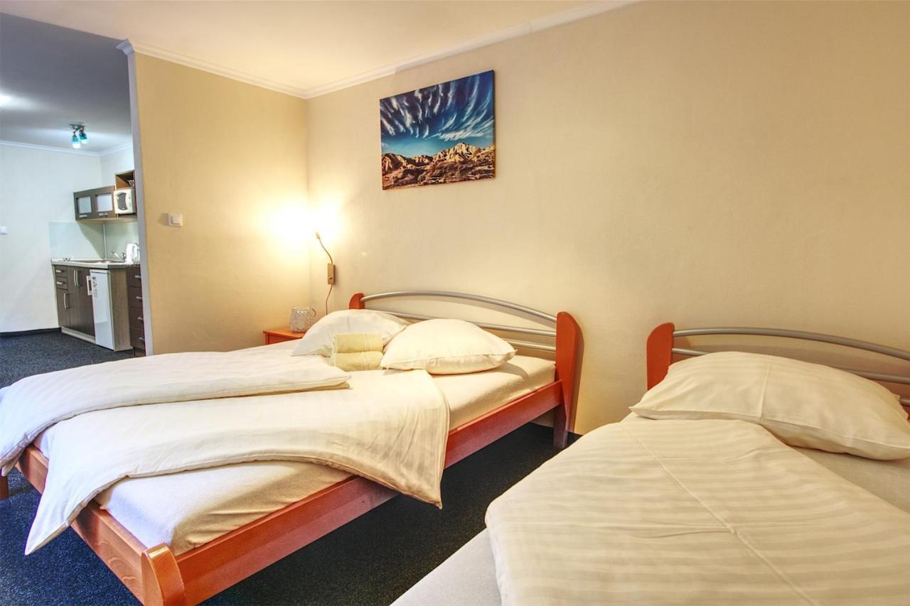 Apartmany Pacific เดมานอฟสกา โดลินา ภายนอก รูปภาพ